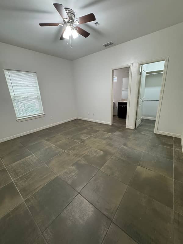 Main bedroom with private bathroom and walk-in closet