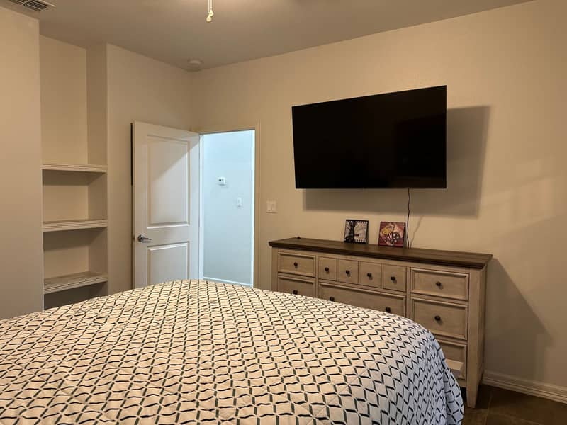 Main bedroom with built-in shelves